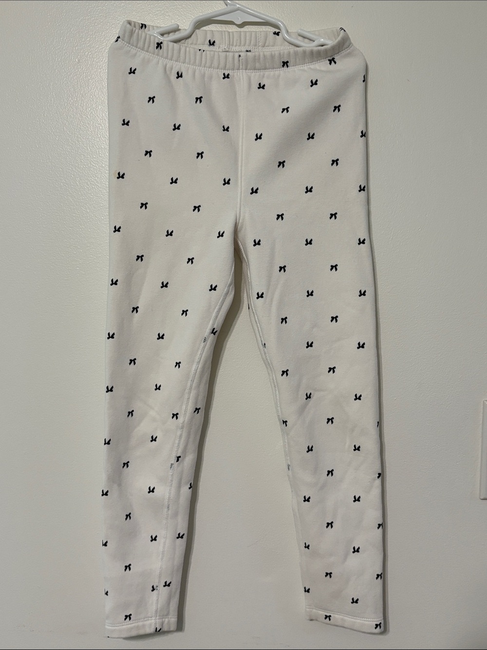 Cat & Jack Cream Leggings with Black Bow Motif